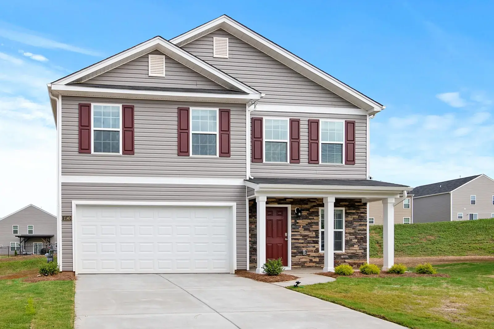 Spacious two-story suburban house with garage, the kind of home we buy in Bacliff