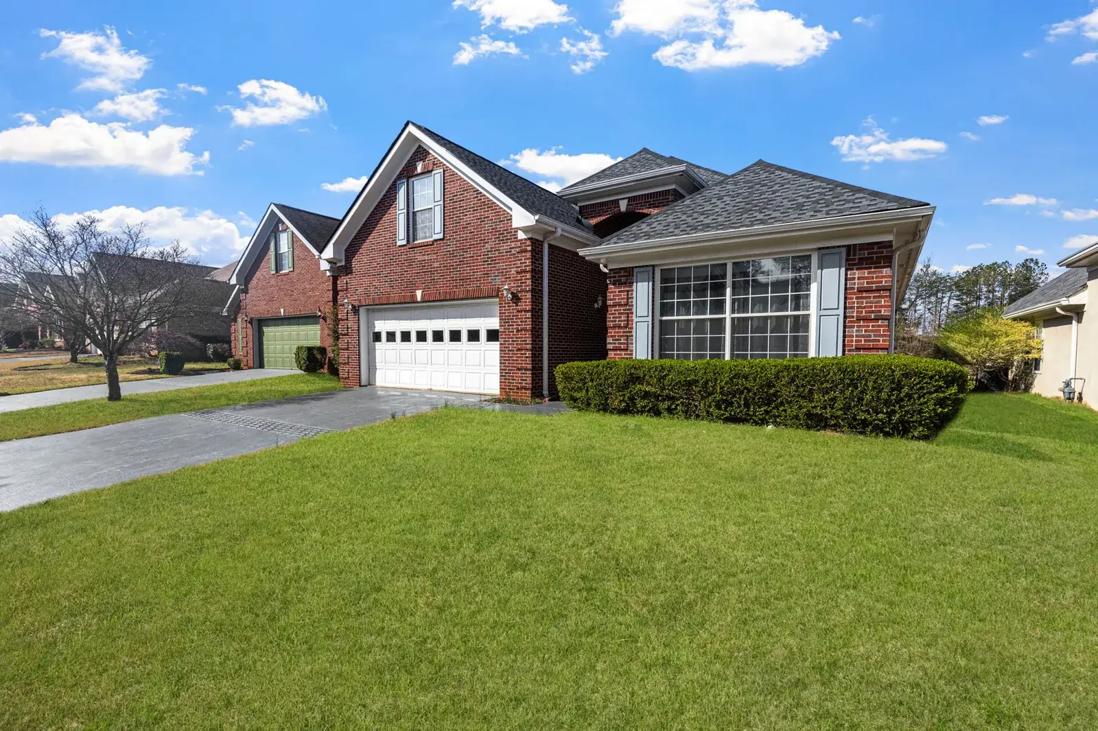 Lovely red brick suburban house, the kind of home we buy in Damon