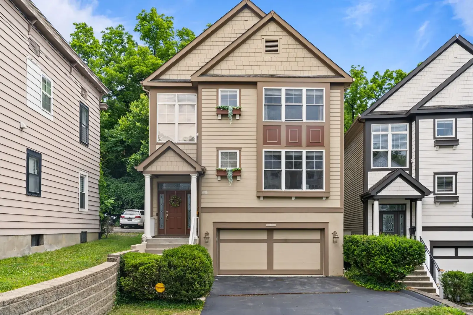 Front view of a modern suburban home, the kind of home we buy in Dickinson
