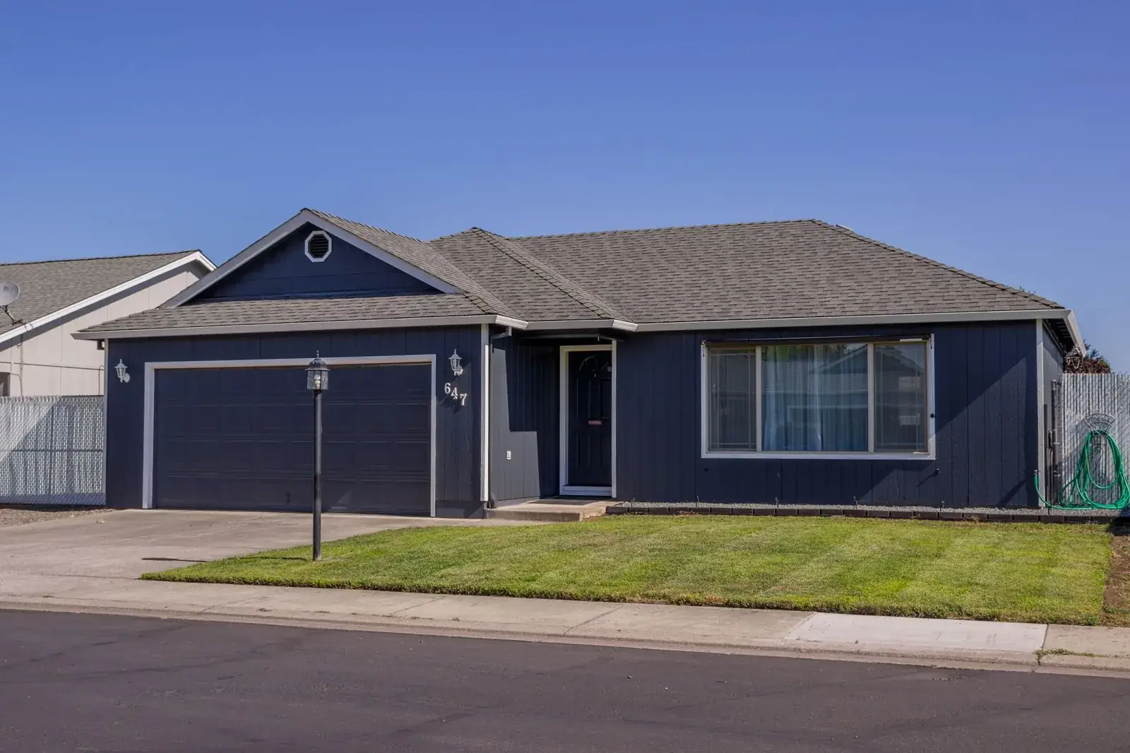 Charming suburban house with driveway, garage, the kind of home we buy in El Lago