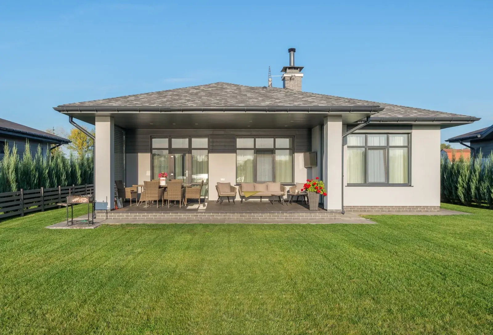 Contemporary house exterior with a large backyard, the kind of home we buy in Hillcrest