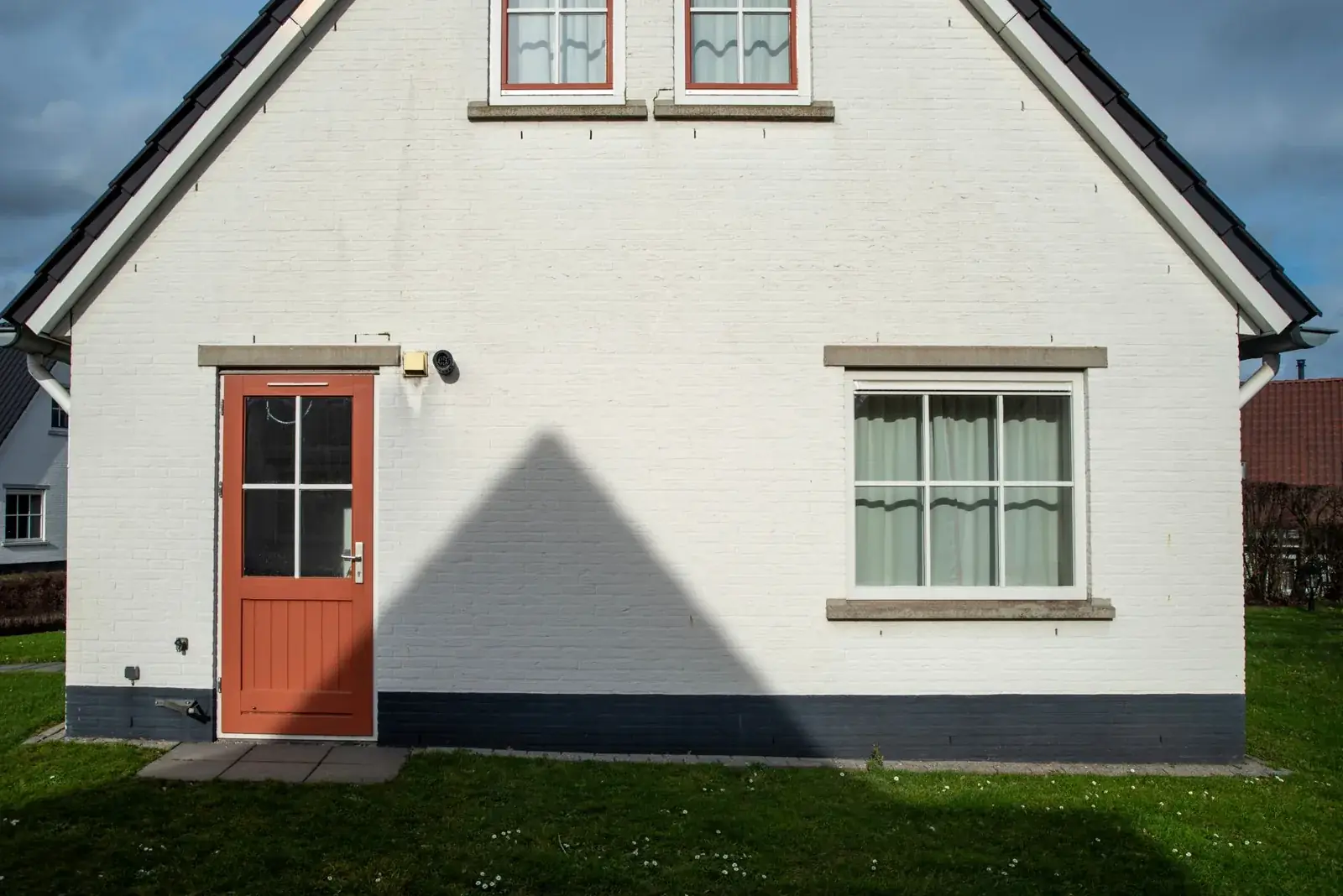 Front view of a charming house, the kind of home we buy in Huffman