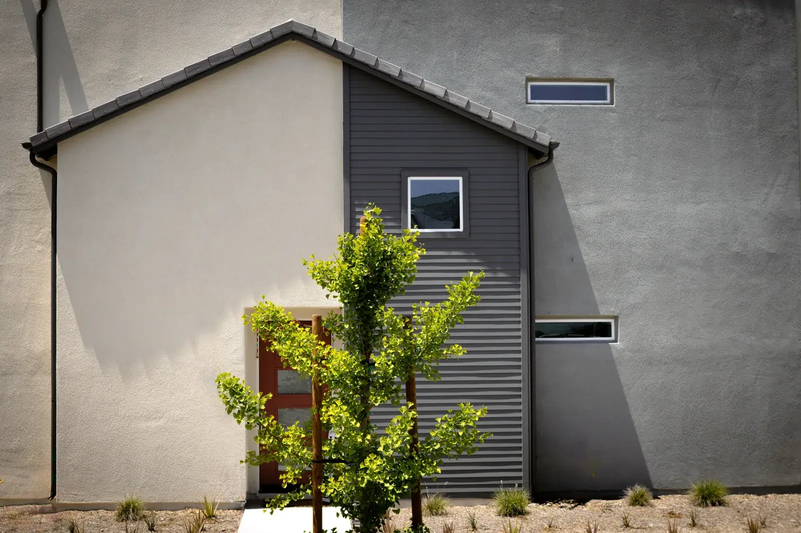 Contemporary residential facade featuring minimalist, the kind of home we buy in Hunters Creek Village