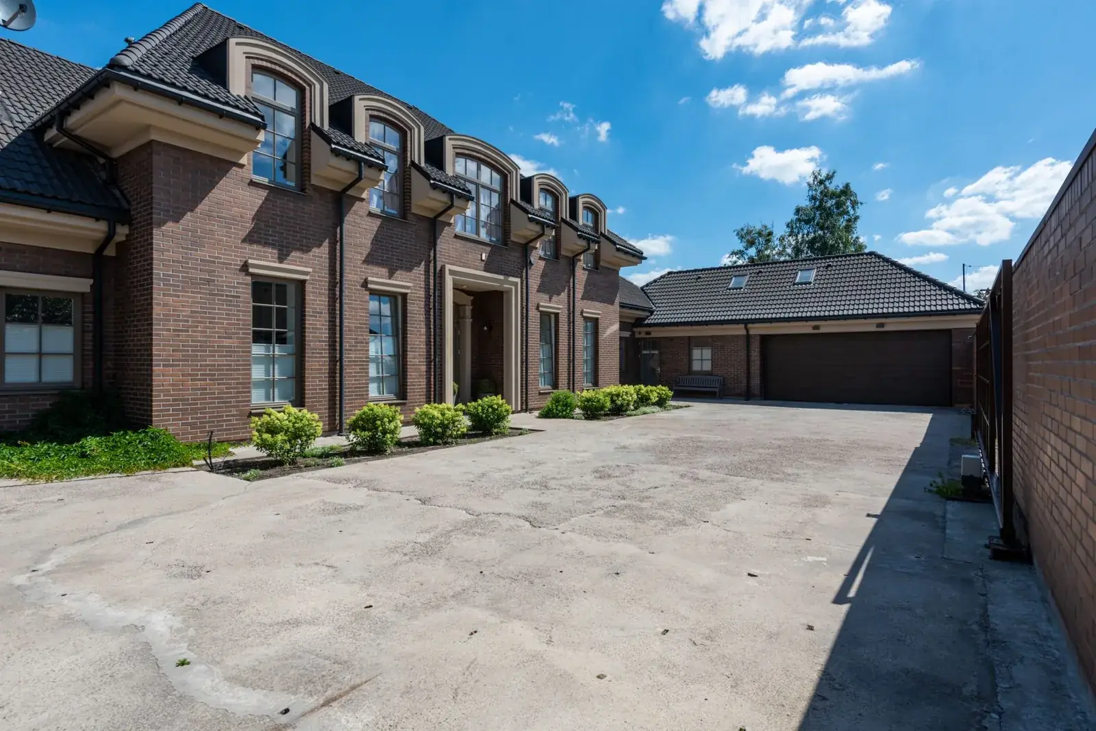 Elegant brick house exterior, the kind of home we buy in Spring Valley Village